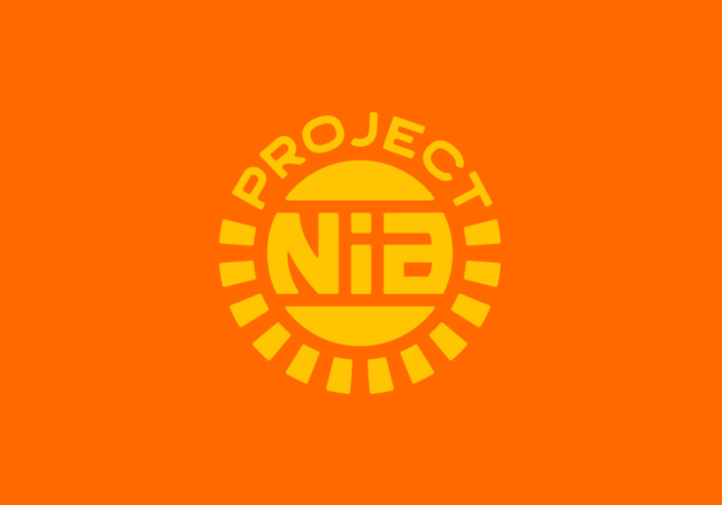 The Project Nia logo, with yellow-gold type set in a circular motif on a deep orange background.